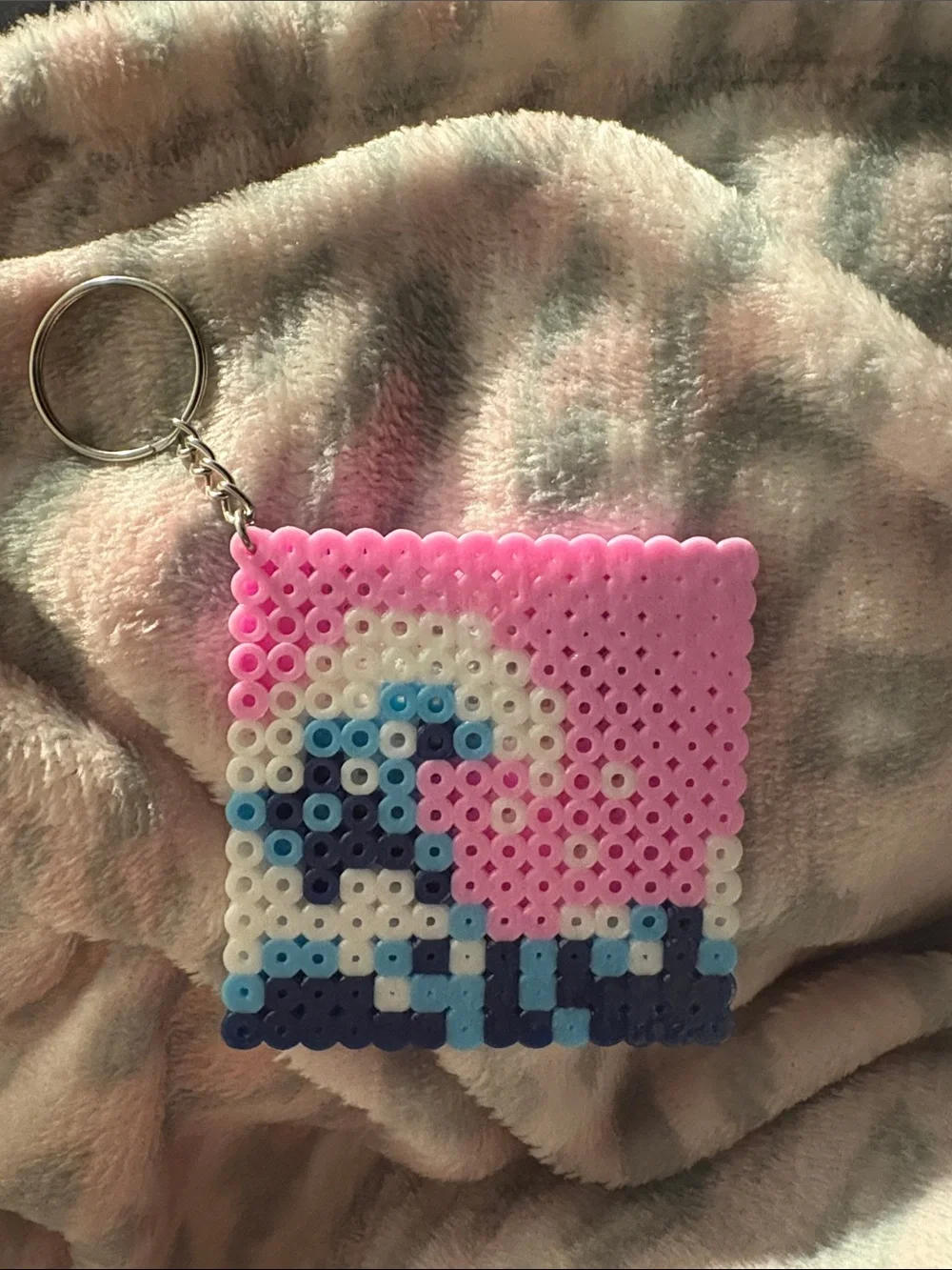 Handmade Pink Perler Bead Keychain with Blue Wave Design